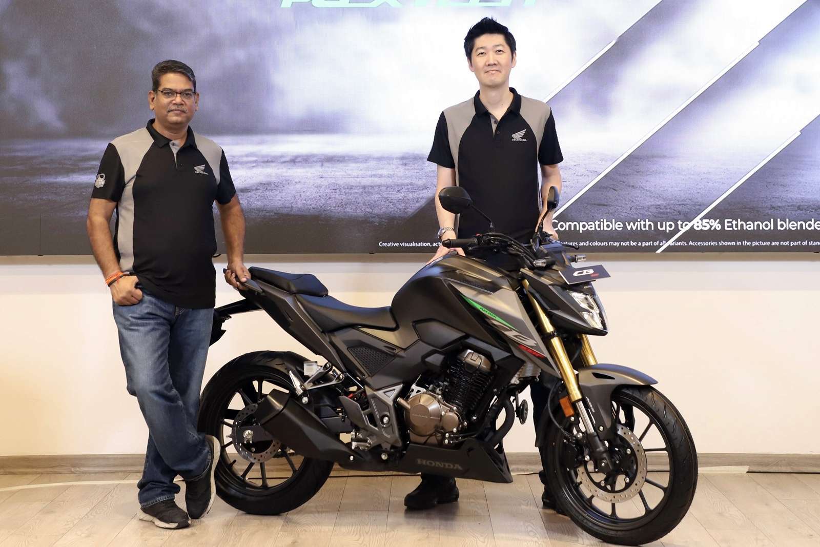 Mr. Yogesh Mathur (Director - Sales & Marketing, HMSI) and Mr. Takeshi Kobayashi (Director - Sales & Marketing, HMSI) with the new Honda CB300F Flex Fuel