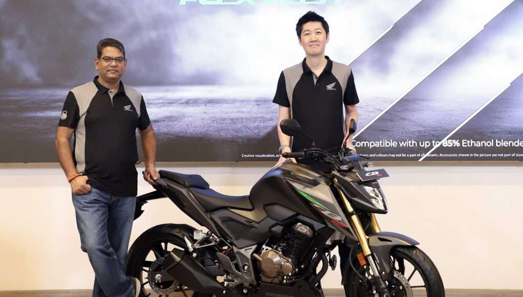 Mr. Yogesh Mathur (Director - Sales & Marketing, HMSI) and Mr. Takeshi Kobayashi (Director - Sales & Marketing, HMSI) with the new Honda CB300F Flex Fuel