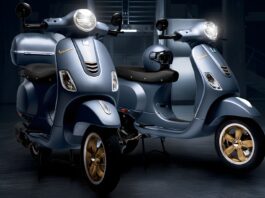 Vespa Officina 8 with standard helmet and optional top box